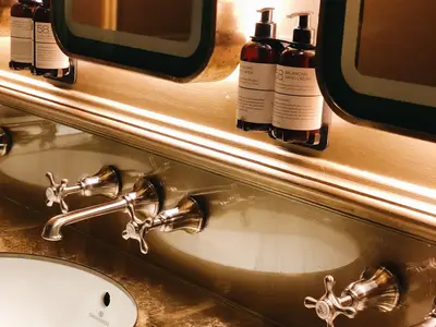 Basins with traditional cross-head taps in a London bathroom